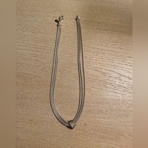 Sterling silver knot necklace.